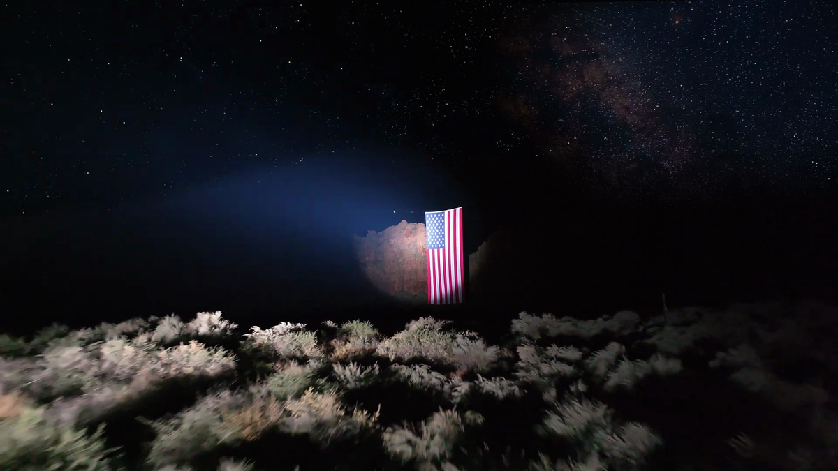 American flag in Snow Canyon State Park at night. 